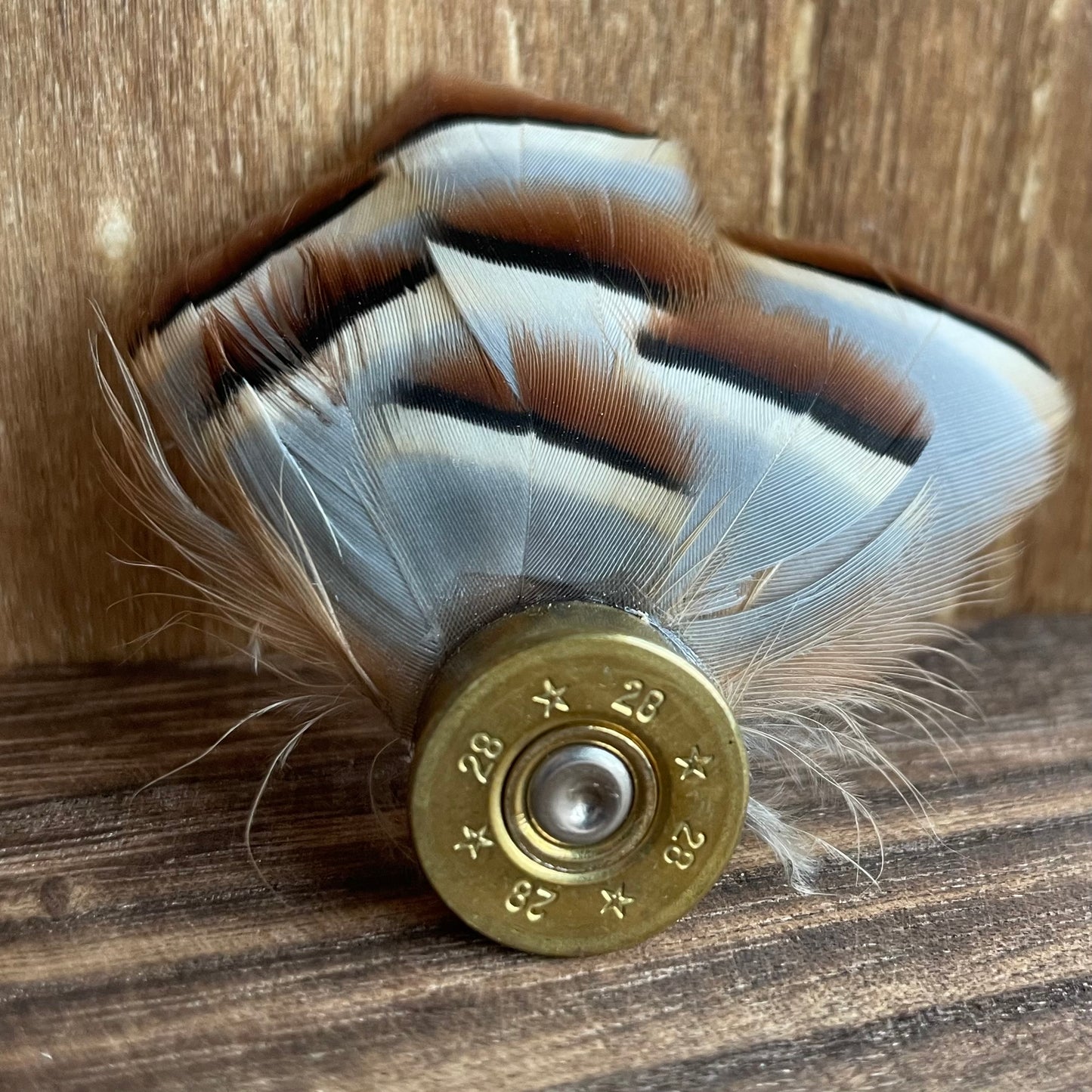 Feather button hole