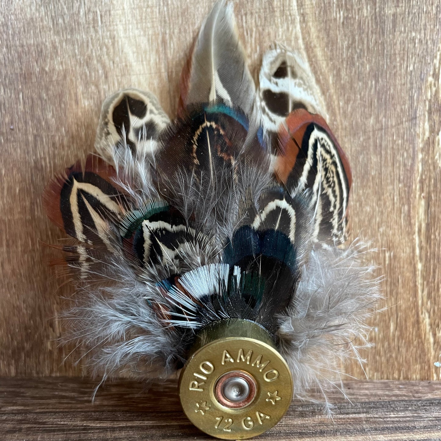 Feather pin