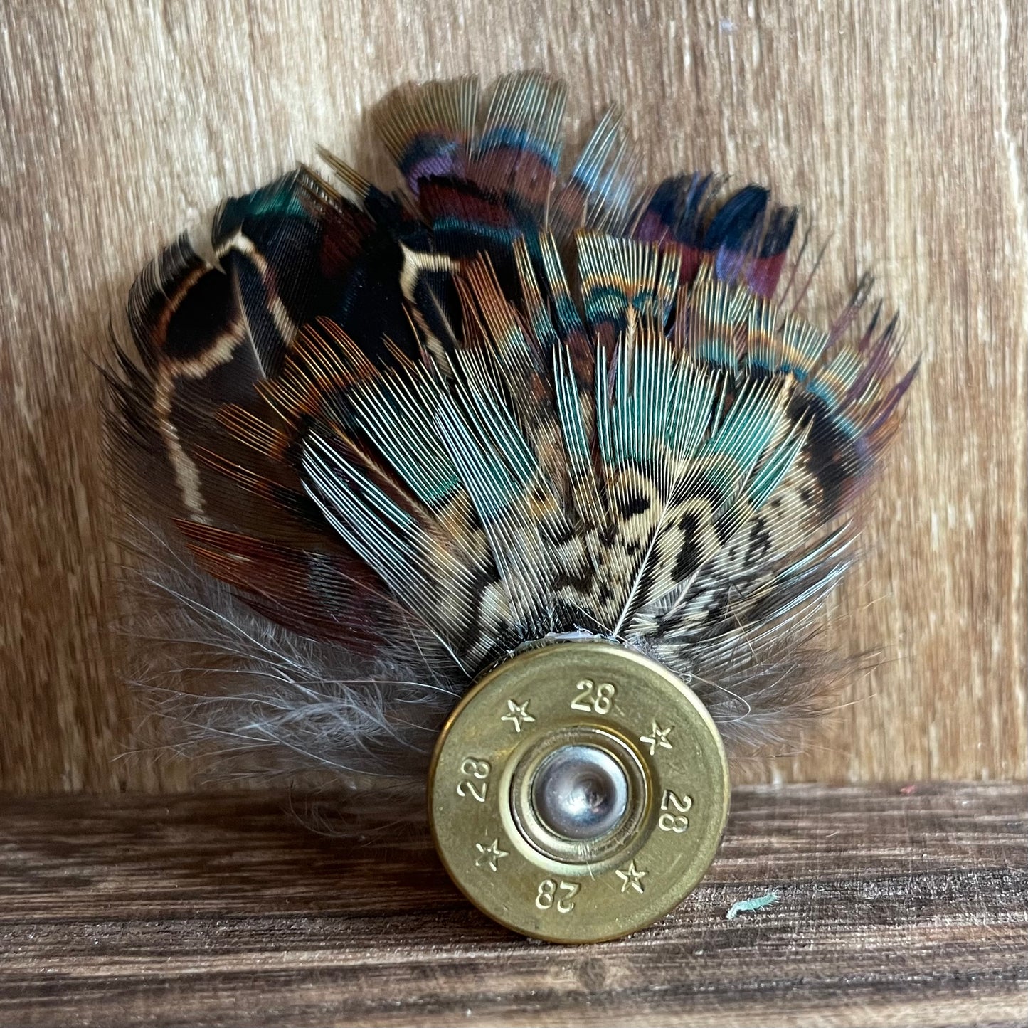 Feather button hole